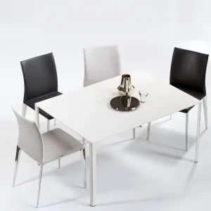 Molteni dart chair lessless table