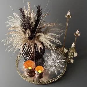 Bouquet of dried flowers in a glass vase on a tray