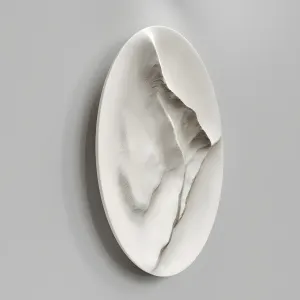 Round wall panel from a mountain stream