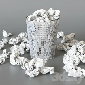 A trash can with papers