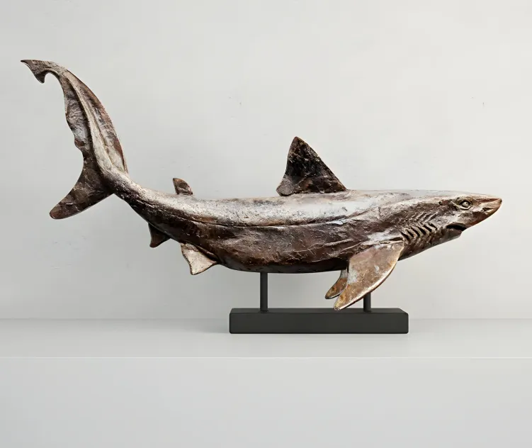 Relief of a swimming shark