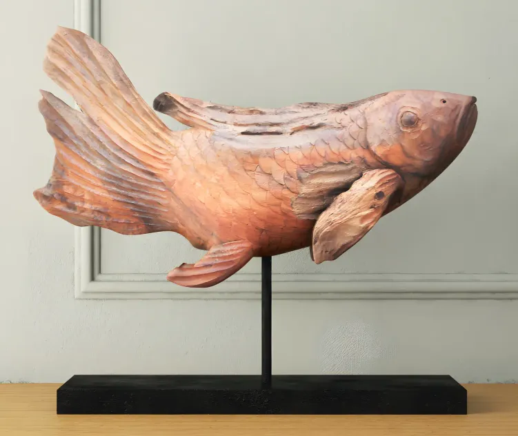 Swimming koi statue